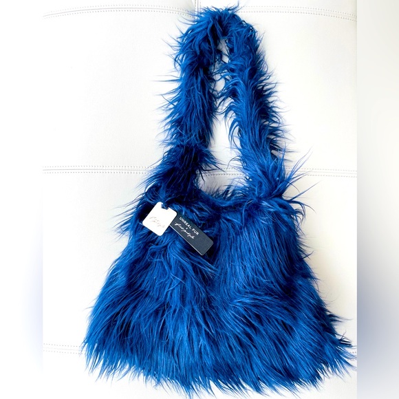 NWT! Free People
Unreal Fur Shoulder Bag
in Navy Baby - Picture 8 of 17